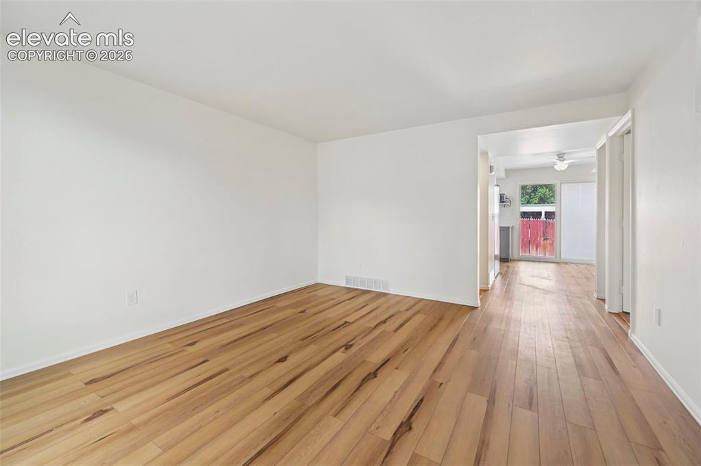 Image 4 of 27: Unstaged living room