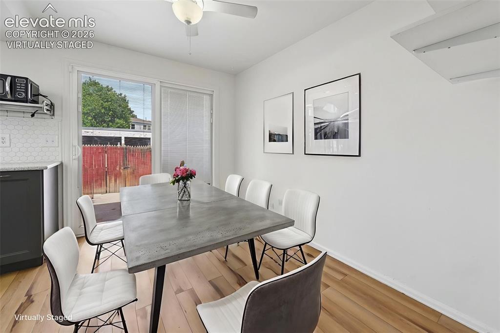 Image 9 of 27: Virtually staged dining room