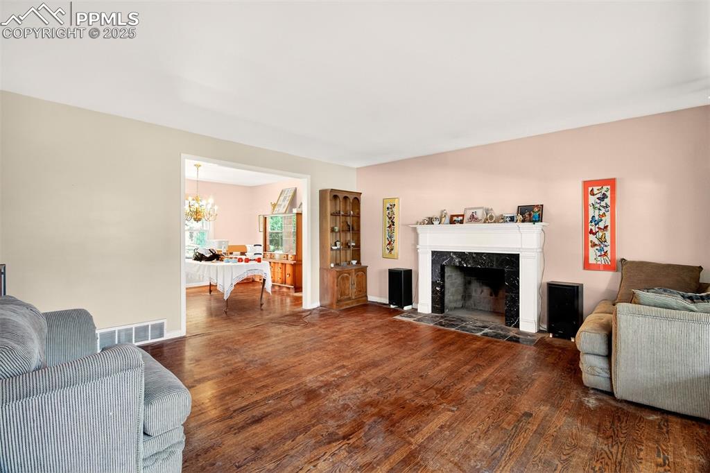 Image 14 of 44: Family room with fireplace