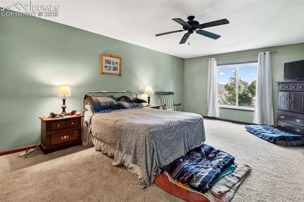 Image 19 of 44: Primary bedroom with en suite bathroom
