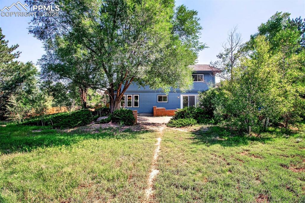 Image 36 of 44: Back of home