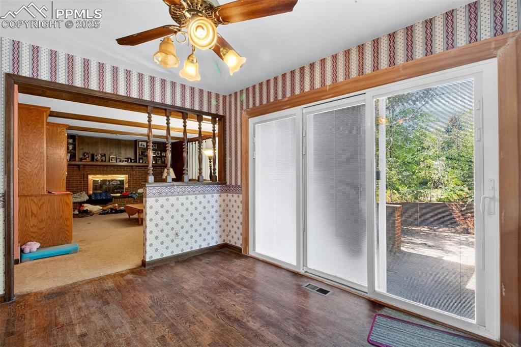 Image 7 of 44: Breakfast area with walk out