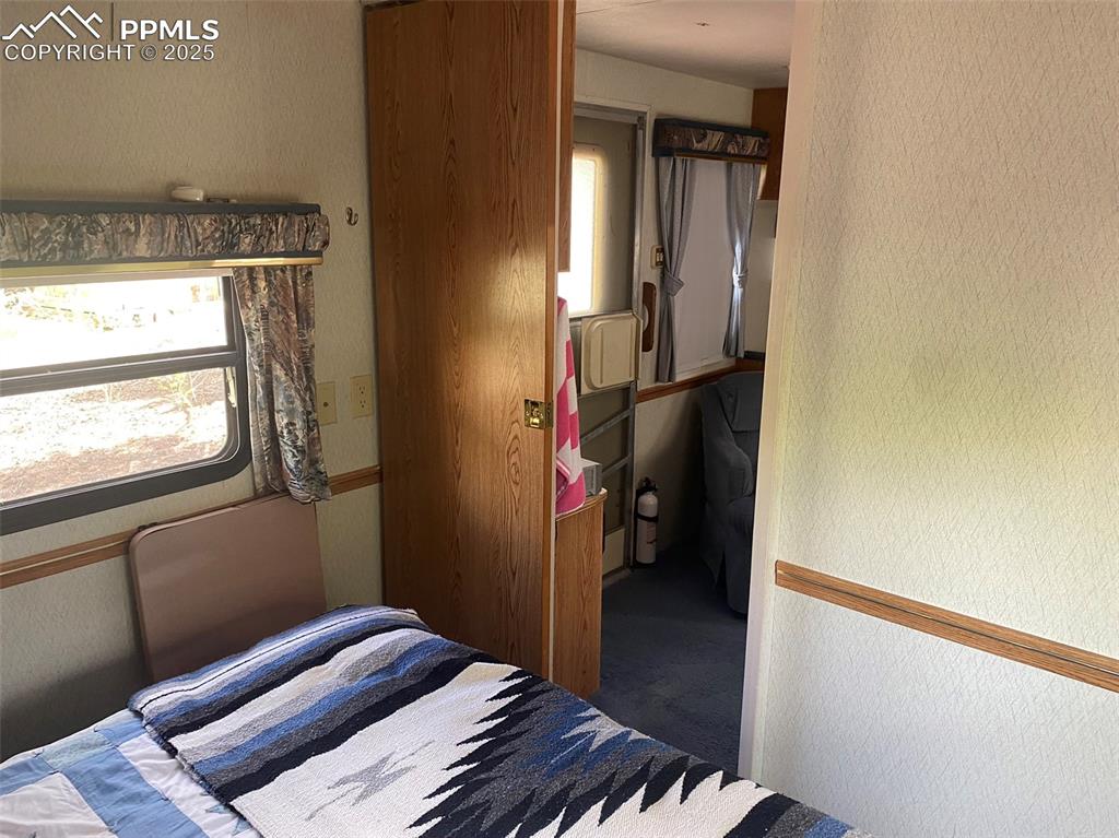 Image 11 of 50: Bedroom