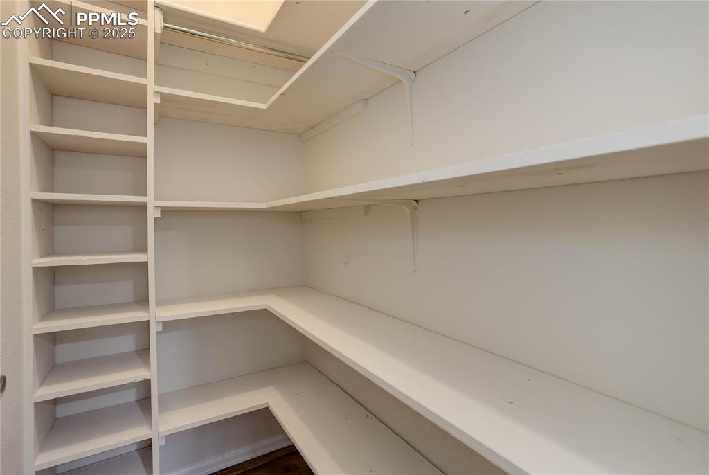 Image 14 of 28: Walk-in closet for Bedroom 2