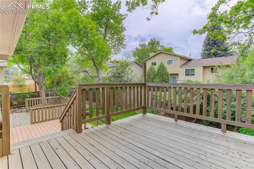 Image 8 of 28: Deck access off of dining area