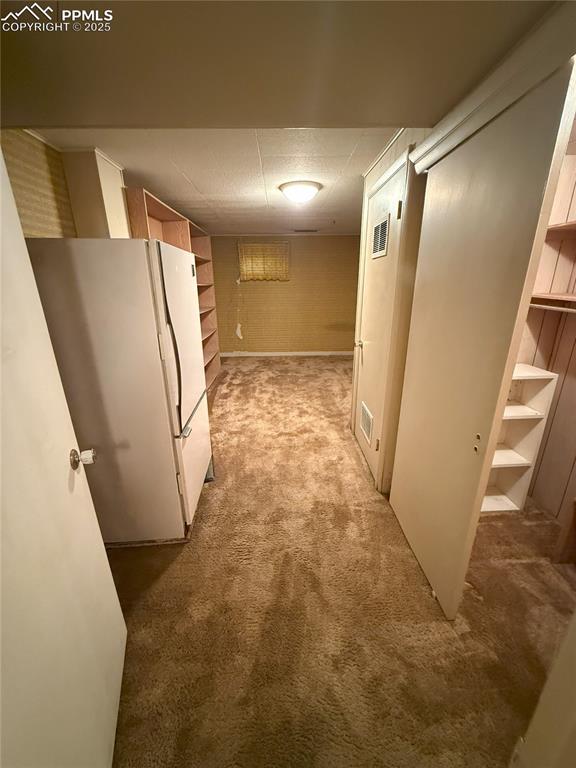 Image 25 of 33: Storage area lower level