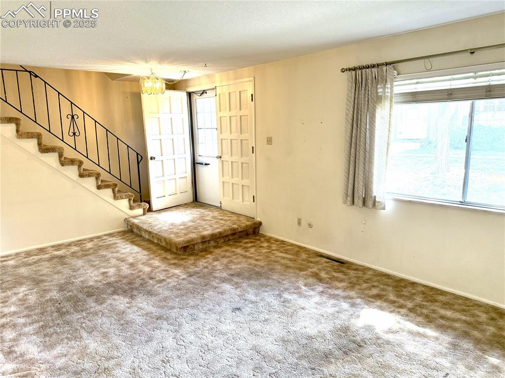 Image 8 of 33: Front entry from dining room