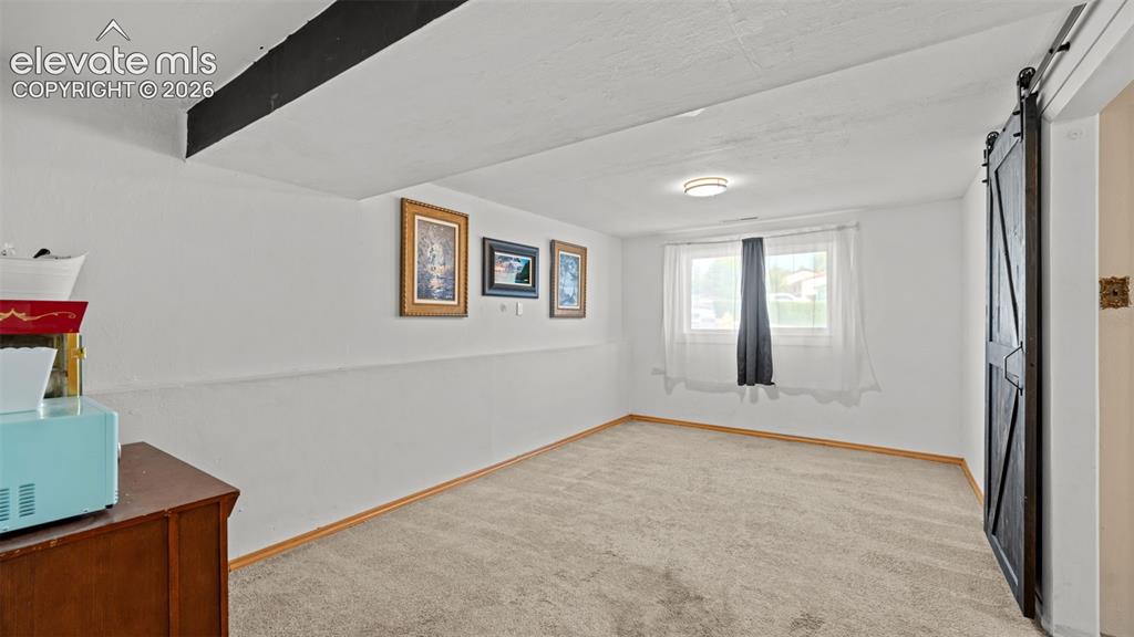 Image 19 of 33: Bedroom