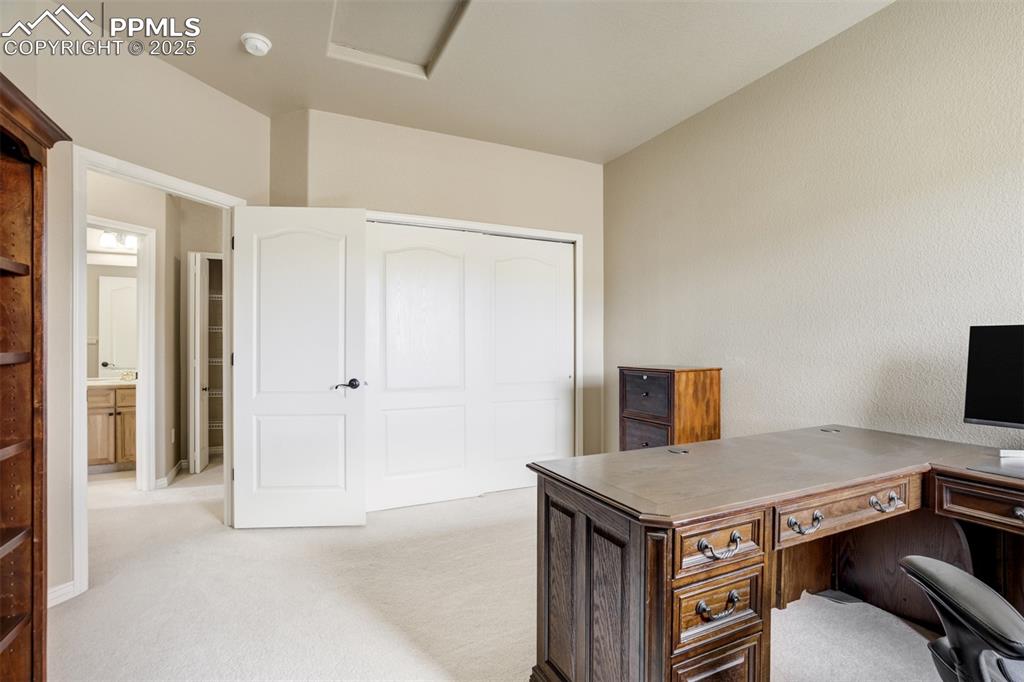 Image 30 of 50: Office area featuring attic access and light colored carpet