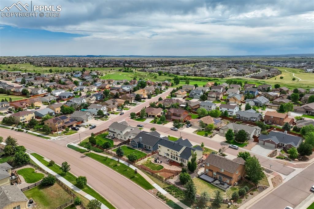 Image 50 of 50: Aerial view of property and surrounding area with nearby suburban area