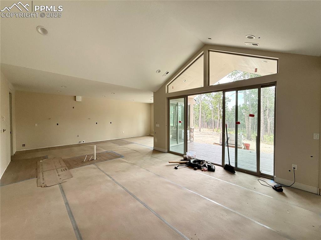 Image 10 of 18: Vaulted Ceilings, Wood Flooring, Gas Fireplace.