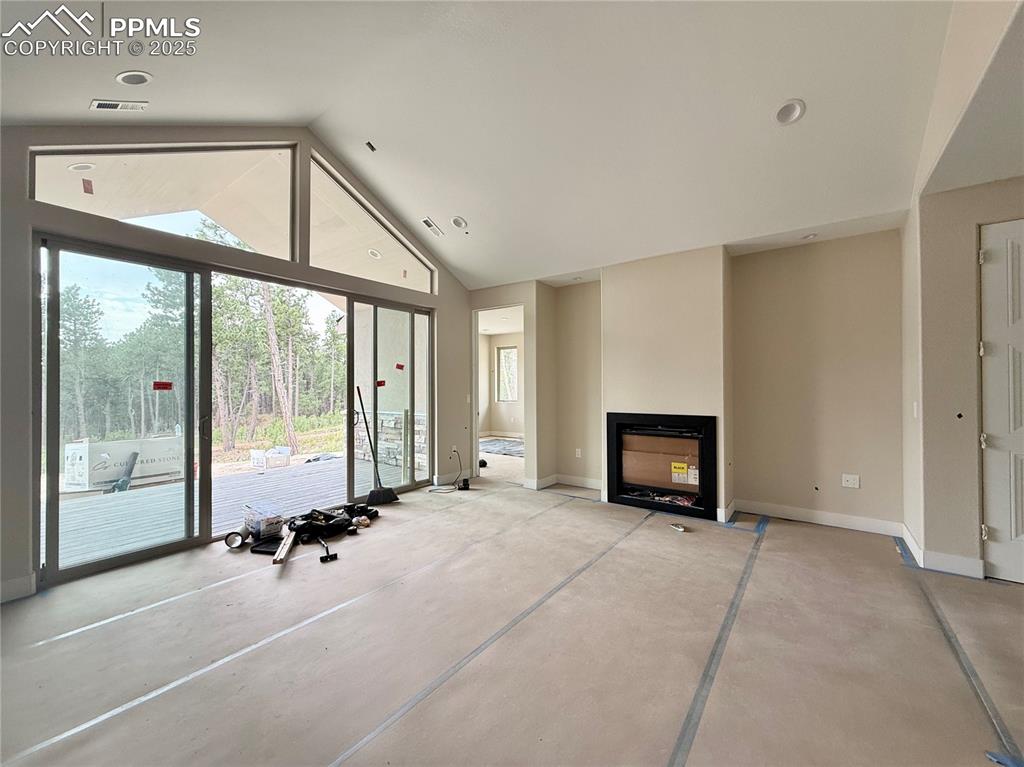 Image 8 of 18: Vaulted Ceilings, Wood Flooring, Gas Fireplace.