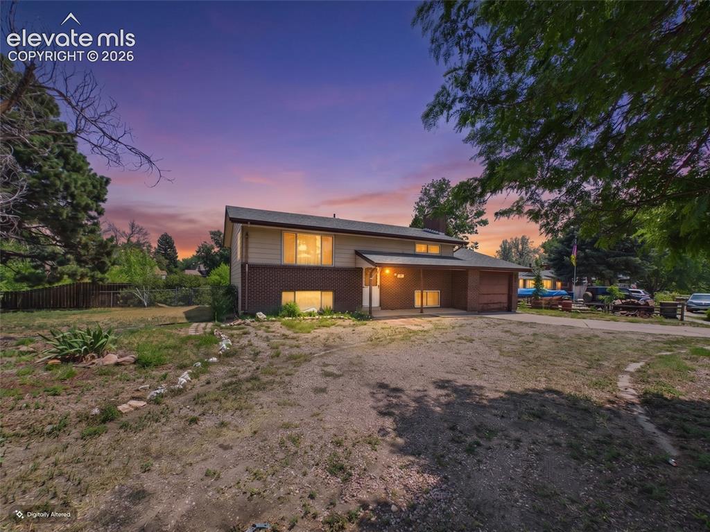 Image 1 of 50: Front Exterior (Twilight) – Attractive twilight view showcasing the home