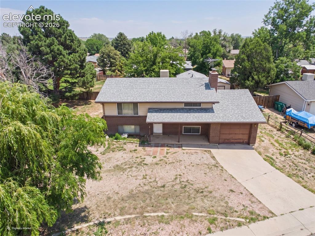 Image 32 of 50: Aerial View – Elevated aerial perspective showcases the home