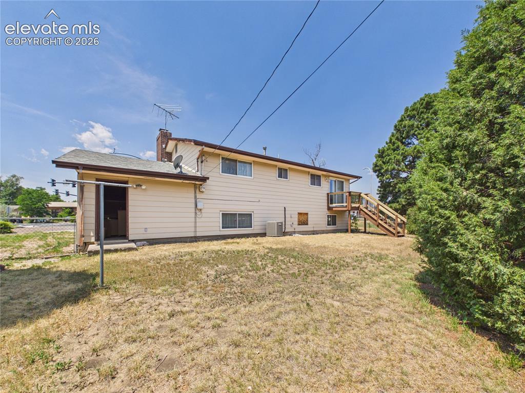 Image 38 of 50: Backyard – Fully fenced backyard features a newly built elevated deck with 