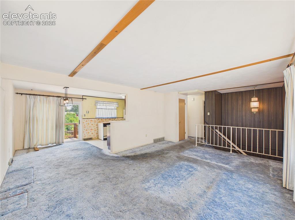 Image 5 of 50: Another view of the expansive living area showcases its flexible layout and