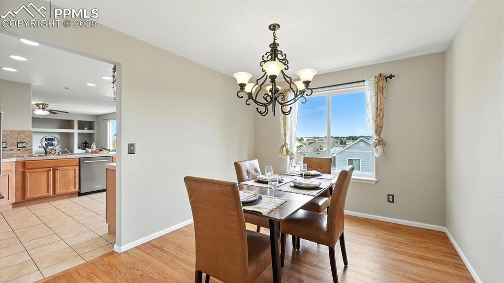 Image 10 of 50: The Dining Room has convenient access to the Kitchen.