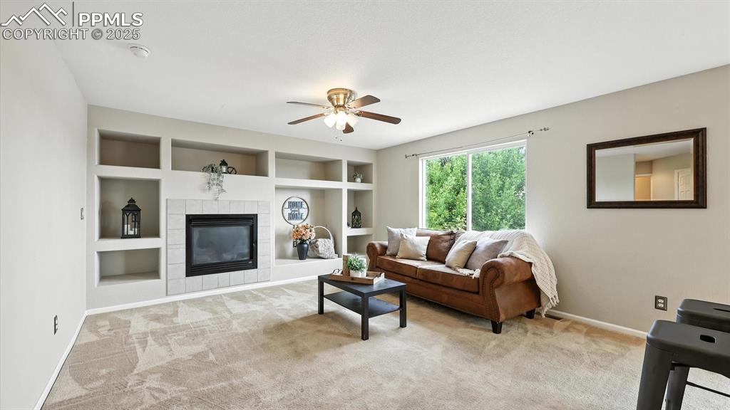 Image 22 of 50: Cozy up to the gas fireplace on chilly winter nights.