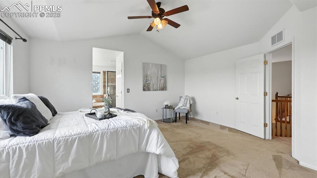 Image 35 of 50: Spacious, vaulted, upper level Primary Suite.