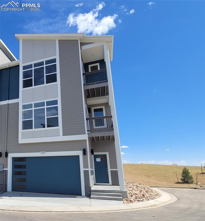 Image 1 of 39: Peak View-Modern Elevation-End Unit-2 Car Garage-VIEWS-3 Story-Desirable Ce