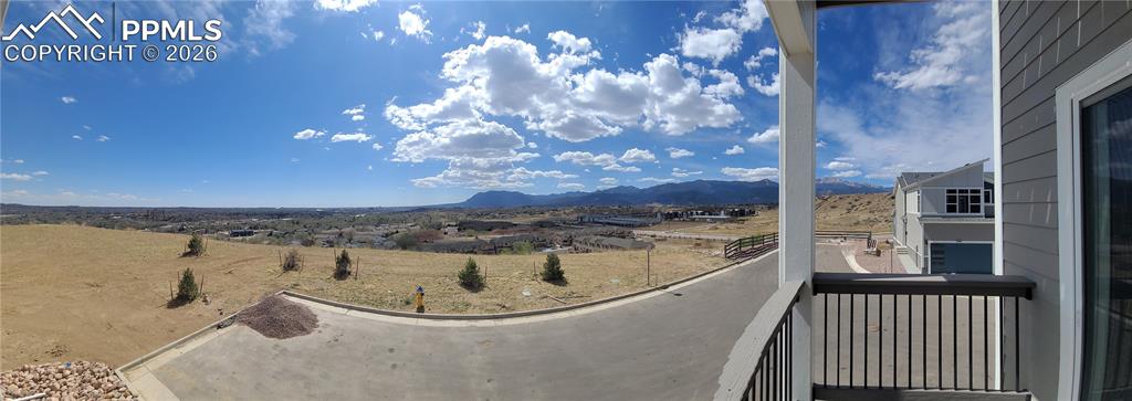 Image 22 of 39: Living room with LVP flooring, LED Lighting, Walk-Out to Deck-Incredible Vi