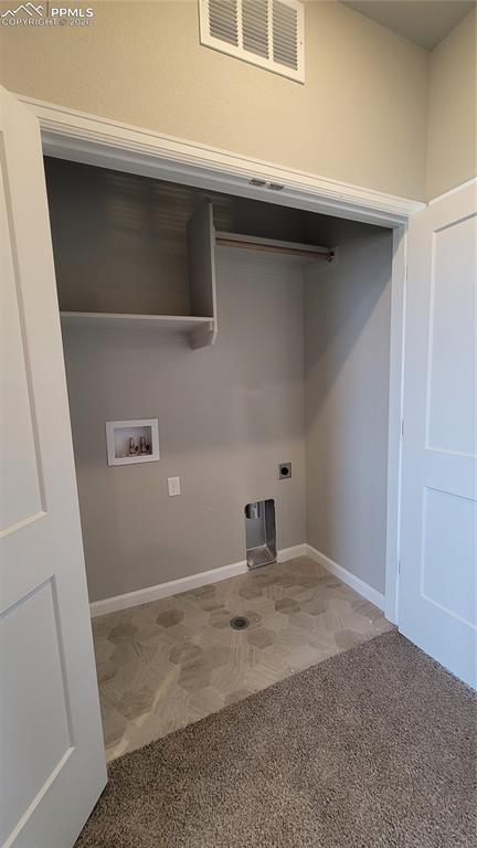 Image 35 of 39: Full bathroom with quartz countertop and tile surround, located on upper le