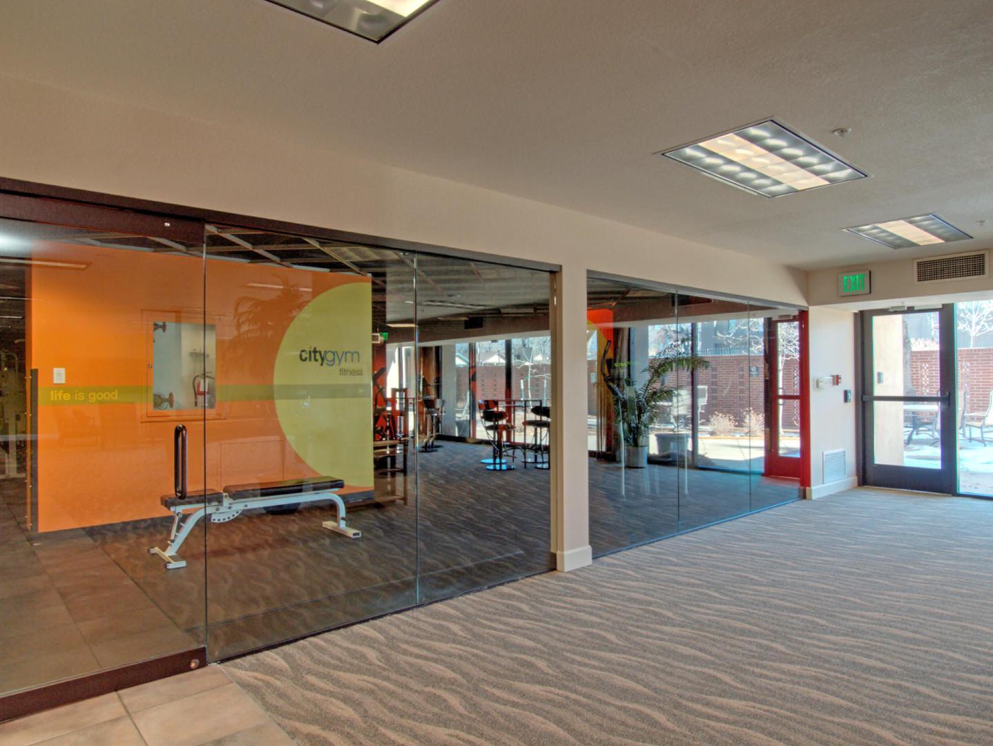 Image 4 of 13: Dining area featuring wood-finish flooring and a ceiling-mounted light fixt